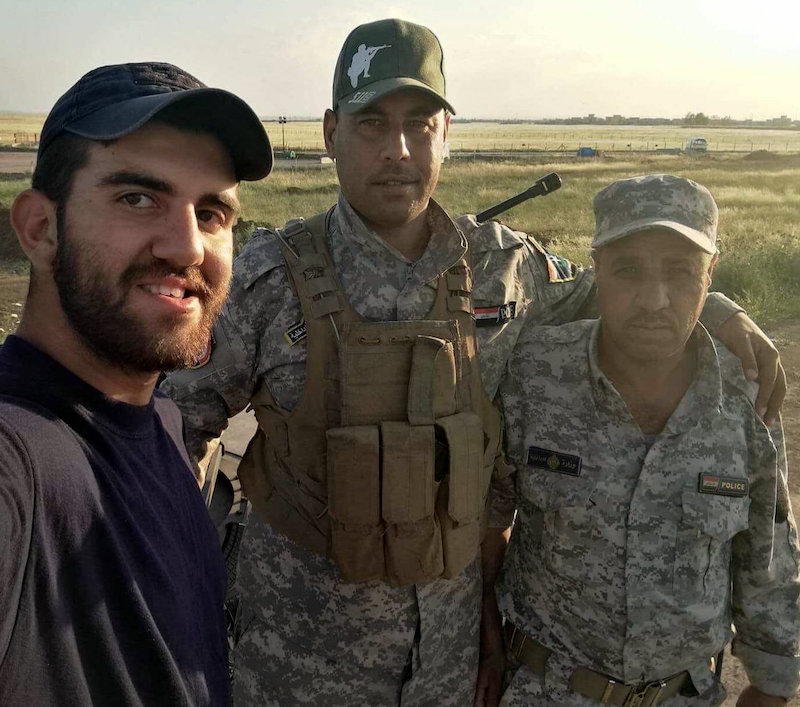 Ayad Saleh in Iraq with two Iraqi police trainees