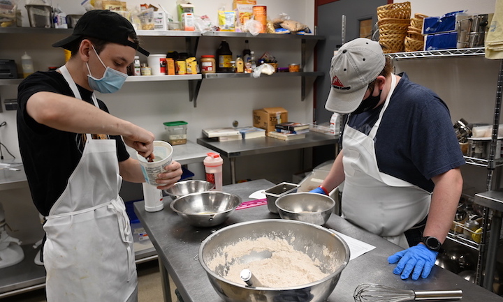 Students prepare a dish in the NIC kitchen